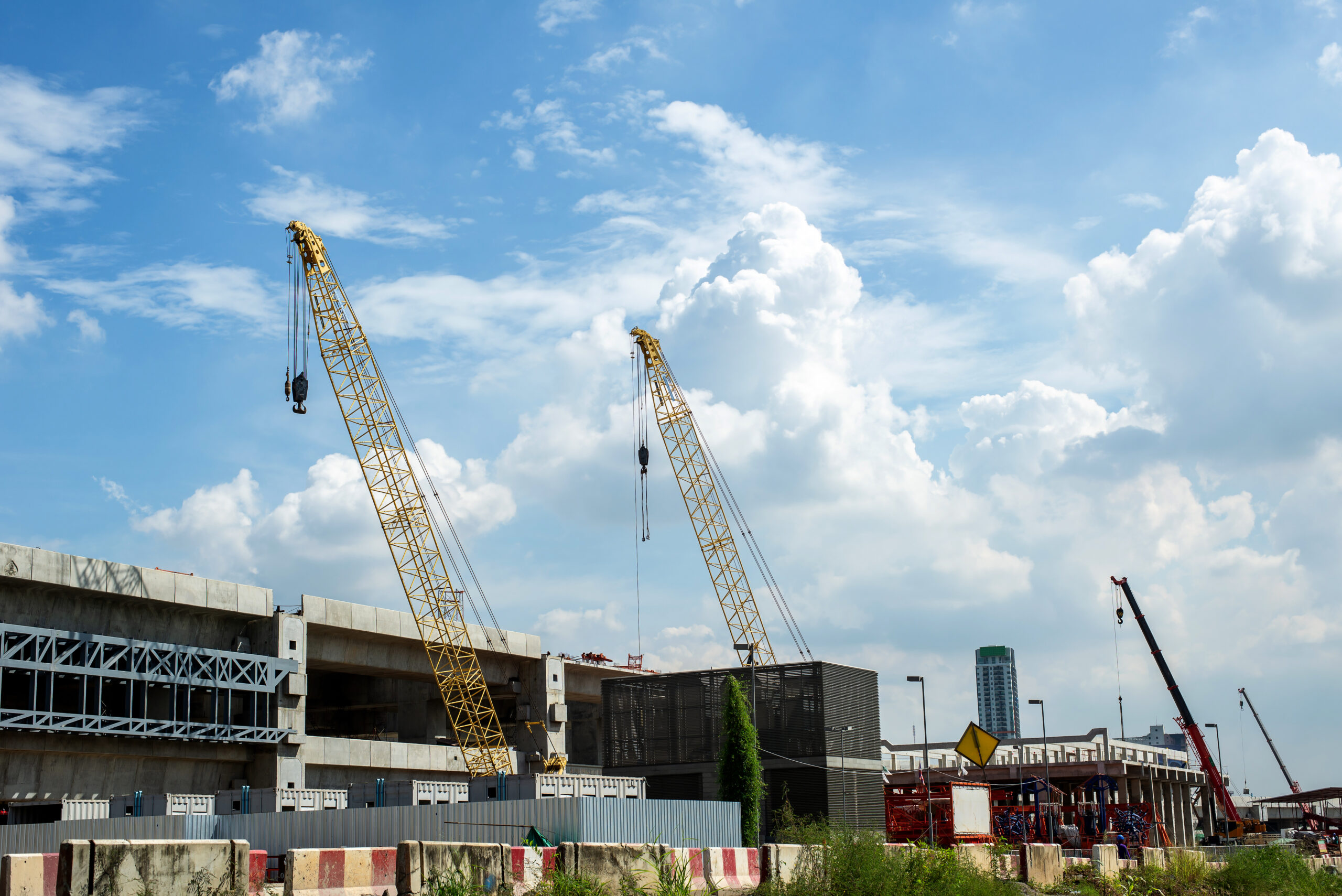 crane building construction work blue sky scaled